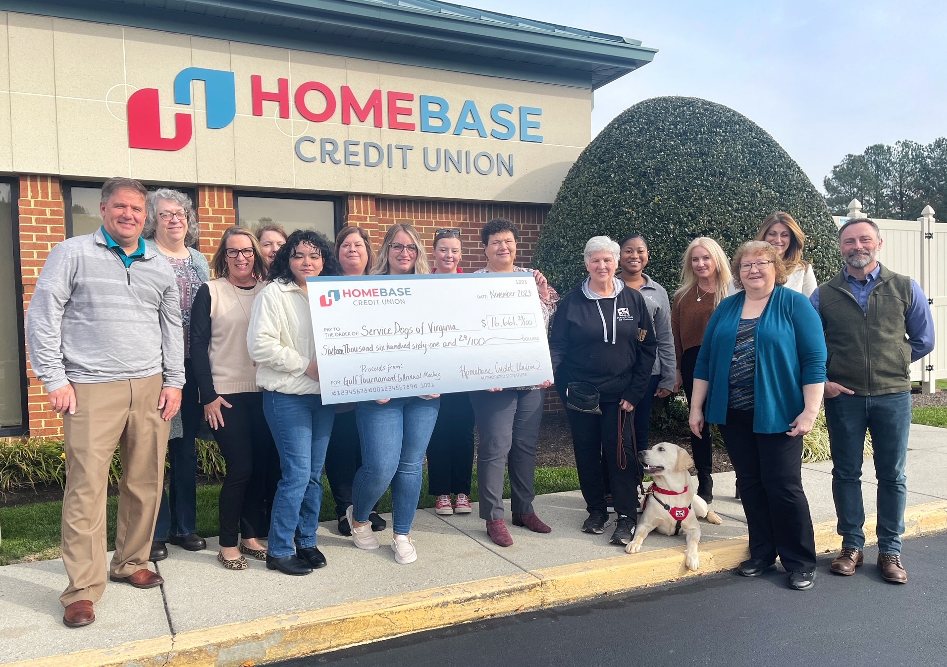 Group displaying check for Service Dogs