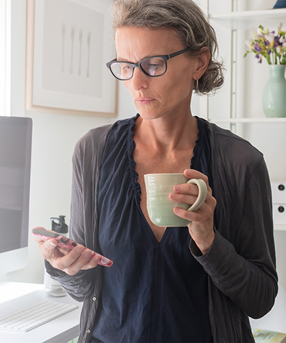 woman looking at phone